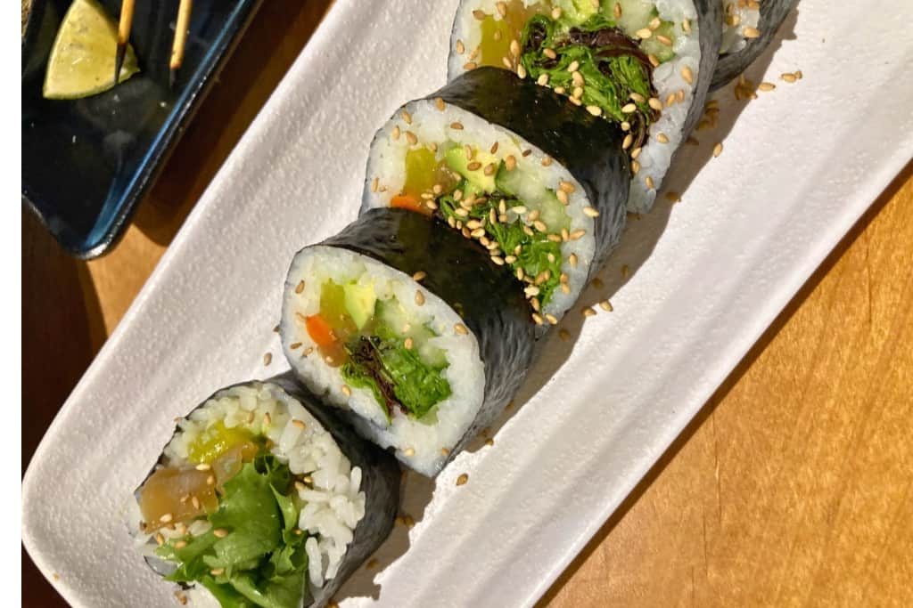 Vegan Sushi in Phoenix Picdture of vegan sushi in Phoenix, AZ. the role is is wrapped with seaweed and is filled with veggies.